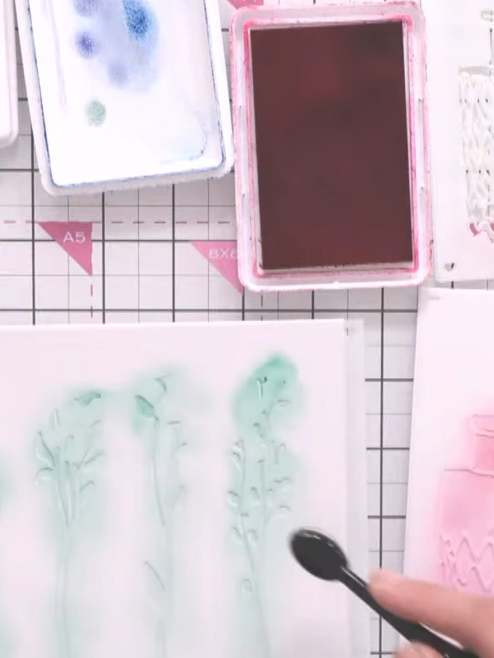 Step 4: Continue with stencil number three from the set, applying the Hedgerow ink through the foliage areas. Press sl