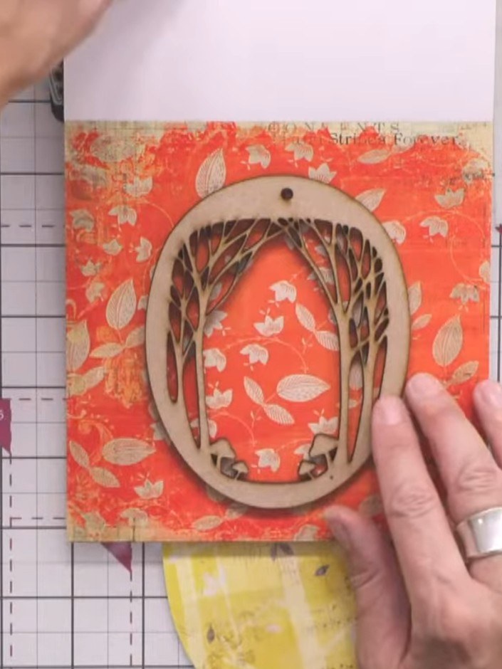 Step 1: Select a piece of patterned paper from the Mellow Moments pad. Choose a design that coordinates with your wood