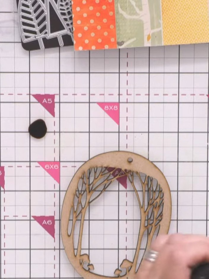 Step 6: Apply acrylic ink or Distress ink directly onto the MDF overlay piece using colours such as Burnt Umber and Ra