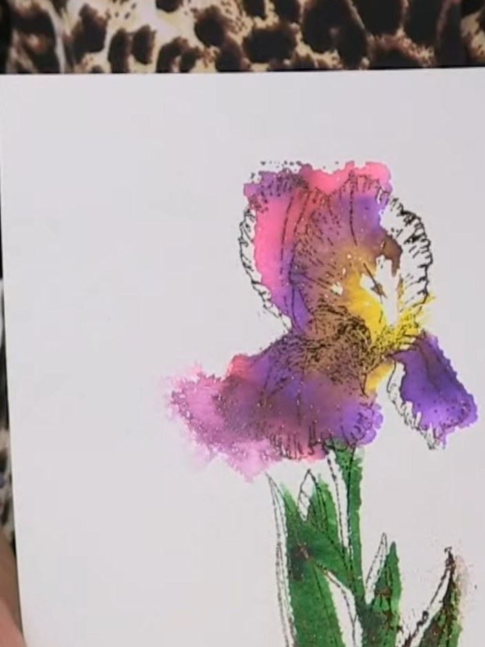Stap 13: Carefully peel away the foil backing sheet to reveal the finished foiled watercolour iris card with its vibran