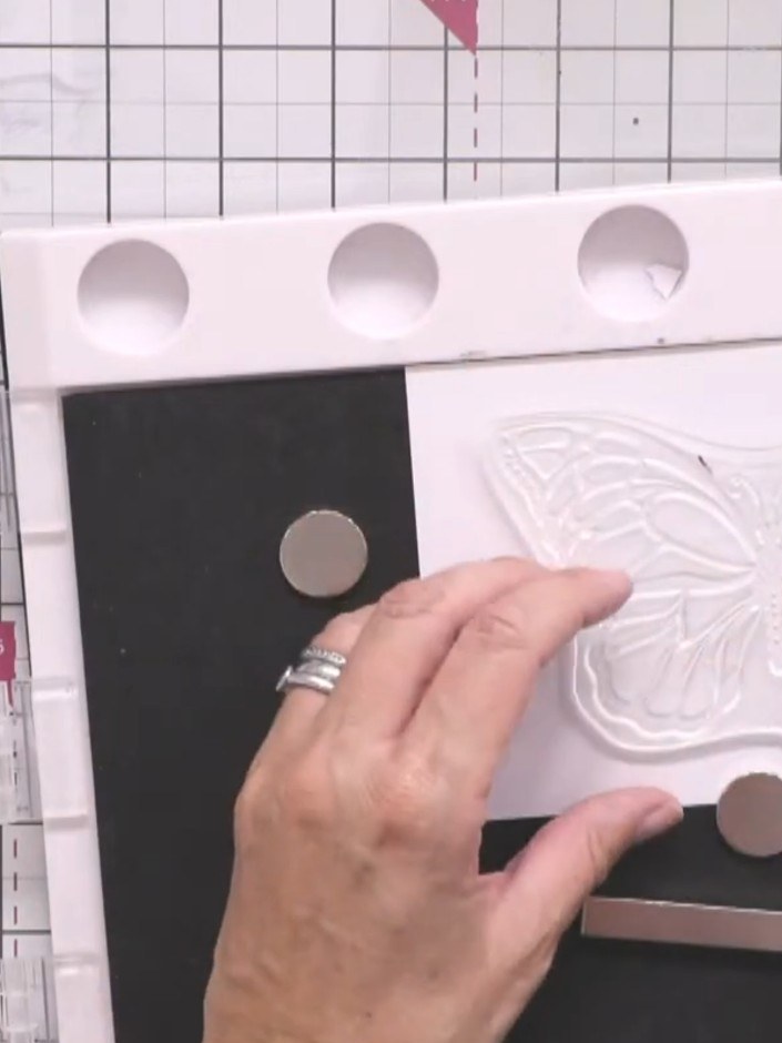 Passo 2: Stamp the large floral butterfly image from the Blooming Butterfly Bundle towards the right-hand edge of the w
