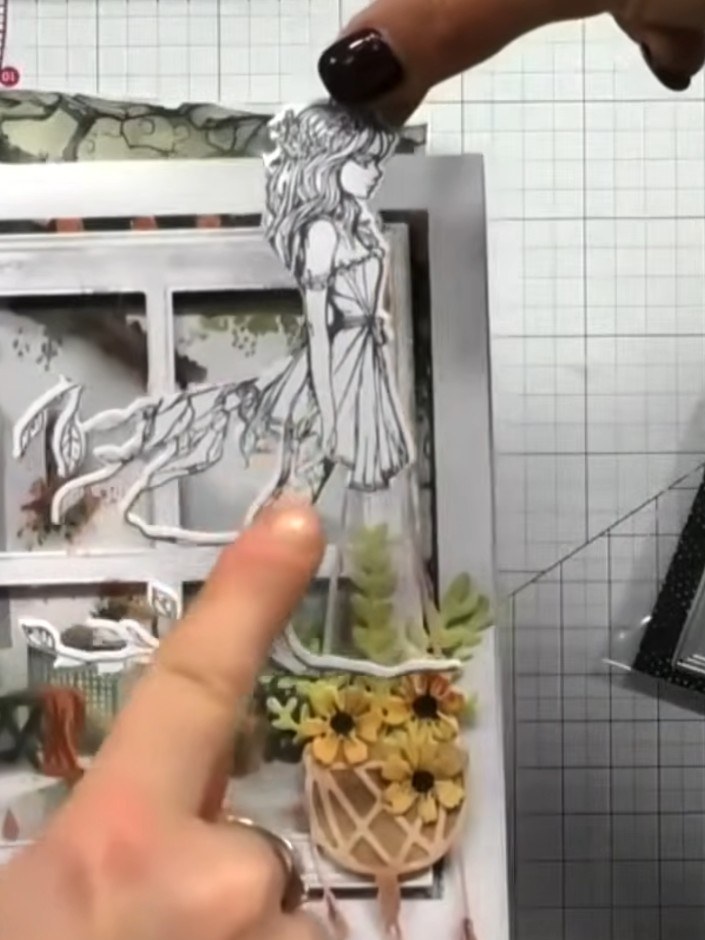 Step 3: Place the window die onto your chosen paper and run it through your die-cutting machine to cut out the window 
