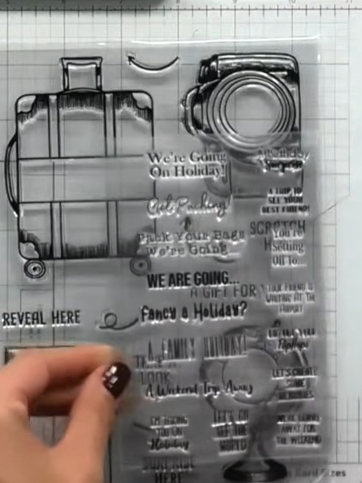 Step 2: Use the mini stamp set to stamp coordinating images and sentiments inside each aperture. Choose phrases such a