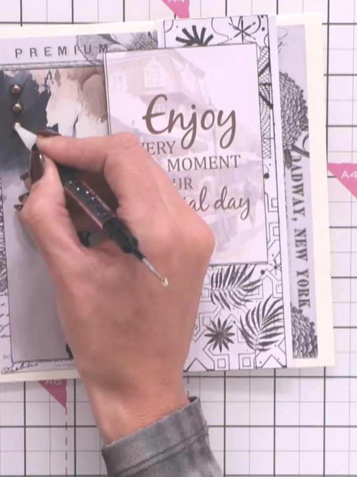 Step 10: Optionally outline the stamped boy silhouette with a black gel pen to add definition. Add additional sparkle d