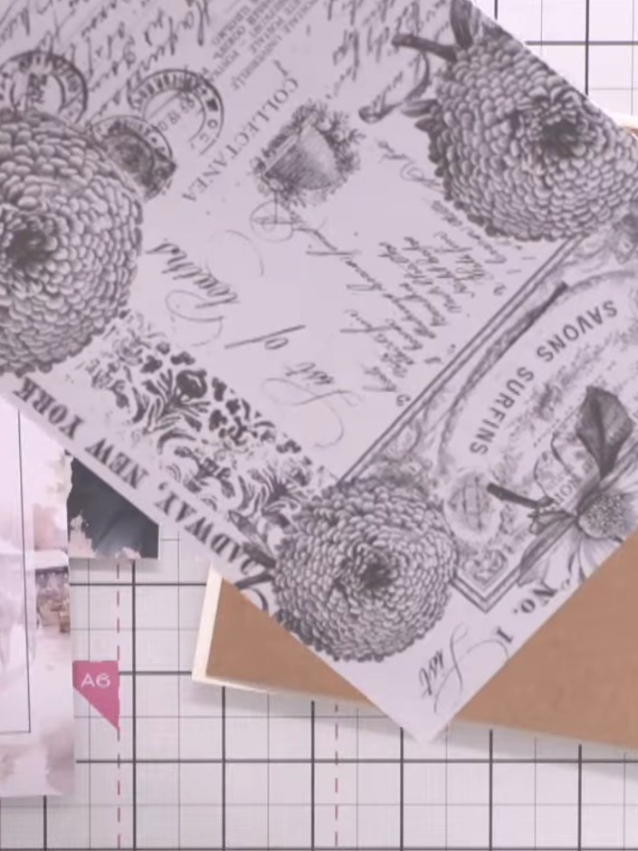 Step 6: Layer the patterned paper pieces onto your kraft card base, positioning them diagonally to create visual inter