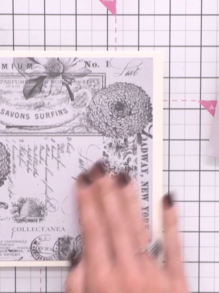 Step 8: Edge the layered papers with black ink using an ink pad to define the edges and prevent them looking flat.