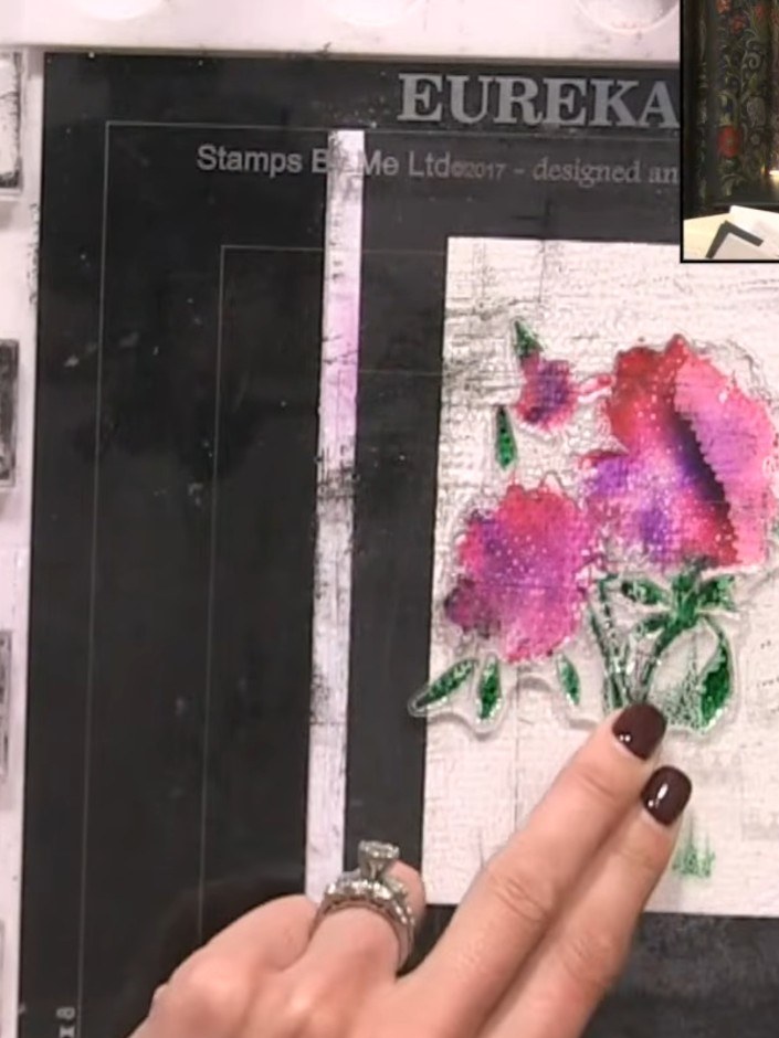 Step 3: Add purple ink to the middle of the flowers using a blending tool or sponge to create colour blending and dept