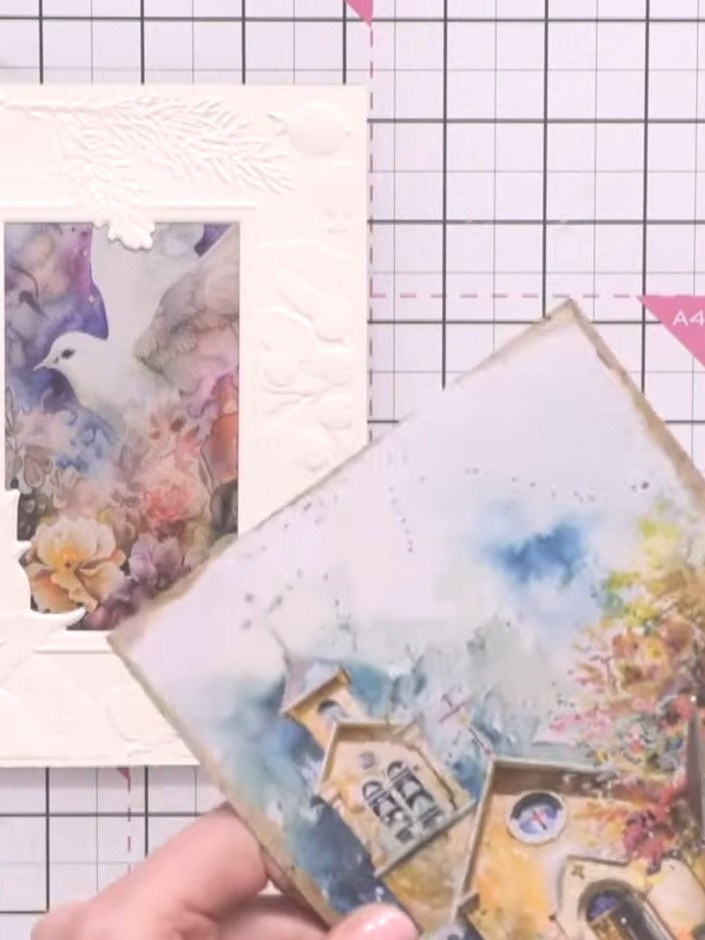 Step 5: Adhere the fussy-cut floral elements from the Heavenly Blooms paper collection to the embossed card using glue