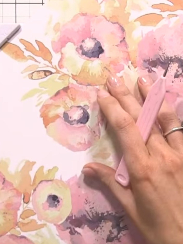 Step 3: Continue scoring and folding down the decorative paper sheet. Repeat the scoring and folding process all the w
