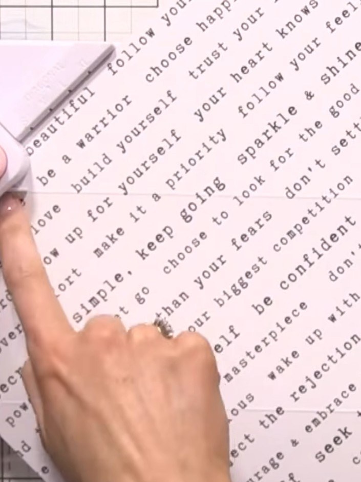 Step 4: Locate the small triangular recesses on the decorative paper sheet and punch these out using your fingers to c