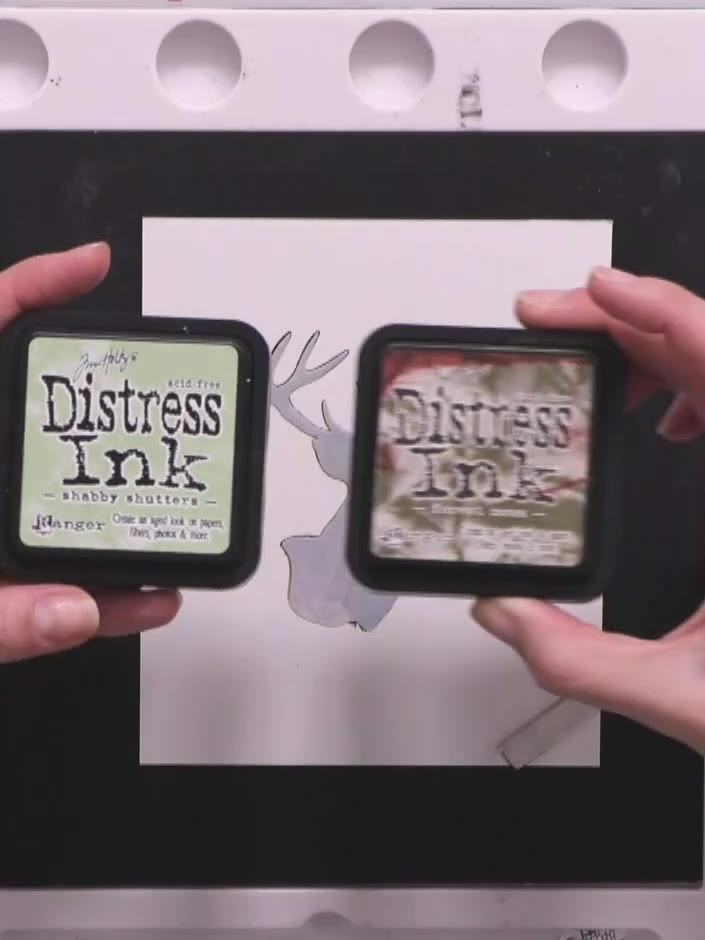 Step 4: Stamp the tree images from the set randomly around the card using Forest Moss and Shabby Shutters Distress ink