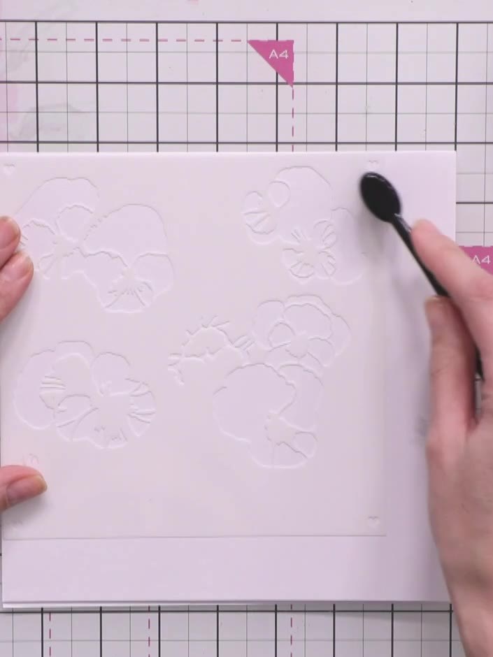 Step 2: Apply your chosen ink colour through the stencil using a blending brush. Press gently to transfer the colour o