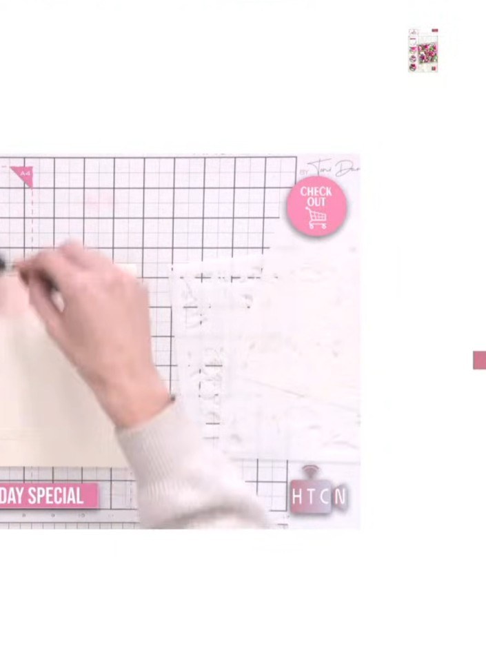Step 1: Position the first numbered stencil in the corner of your card stock, aligning it with the heart-shaped regist