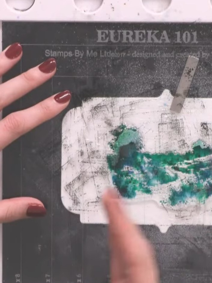 Step 6: Blot away any excess water from the watercolour areas using a tissue or paper towel. Gently dab the surface to