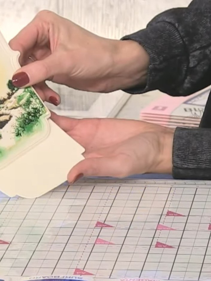 Step 12: Fold the completed card flat for posting. When the recipient receives it, they can stand it upright on a surfa