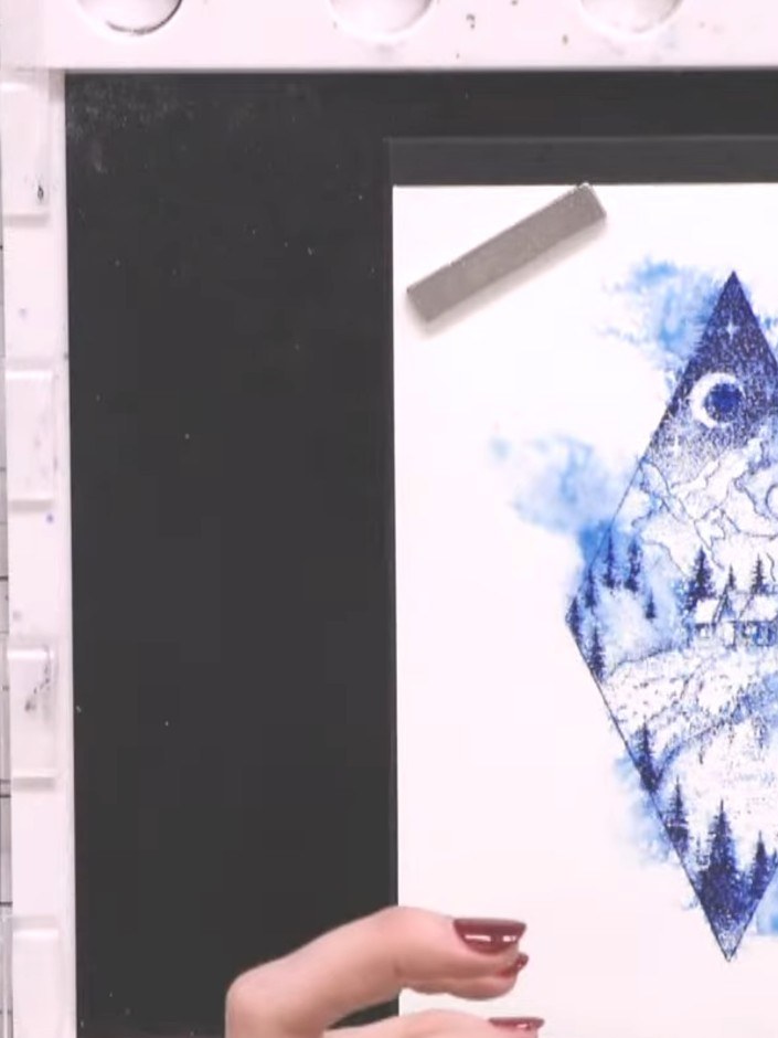 Step 7: Re-stamp the diamond design over the same area using the ocean blue ink to bring back the detail and create a 