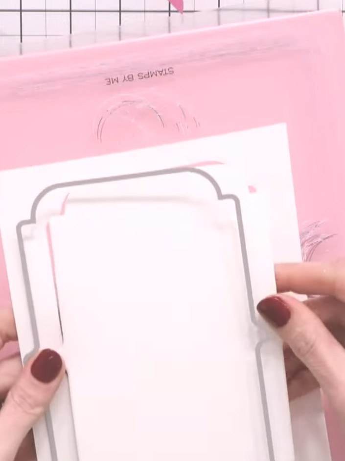 Step 9: Adhere the stamped and sprayed diamond panel onto a cream card blank using adhesive.