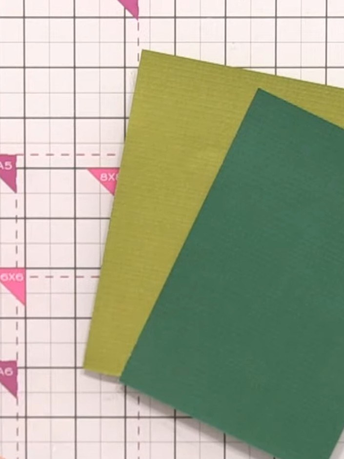 Step 1: Select two shades of green cardstock from your paper pad. Cut the foliage dies from both colours, ensuring you