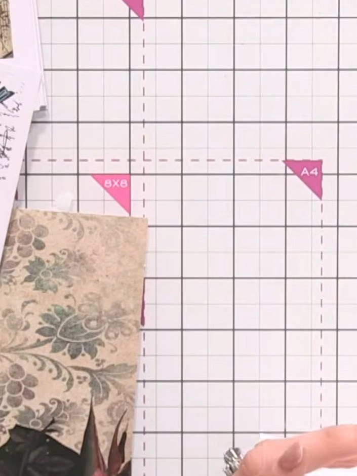 Step 2: Score the album cover along the printed score lines using a scoring tool and ruler. Work carefully along each 