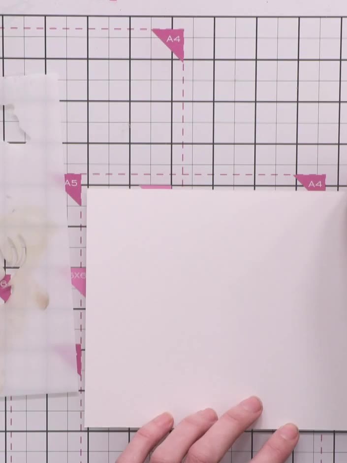 Step 1: Cut your white cardstock to landscape orientation using the large paper trimmer. Trim to the desired size for 