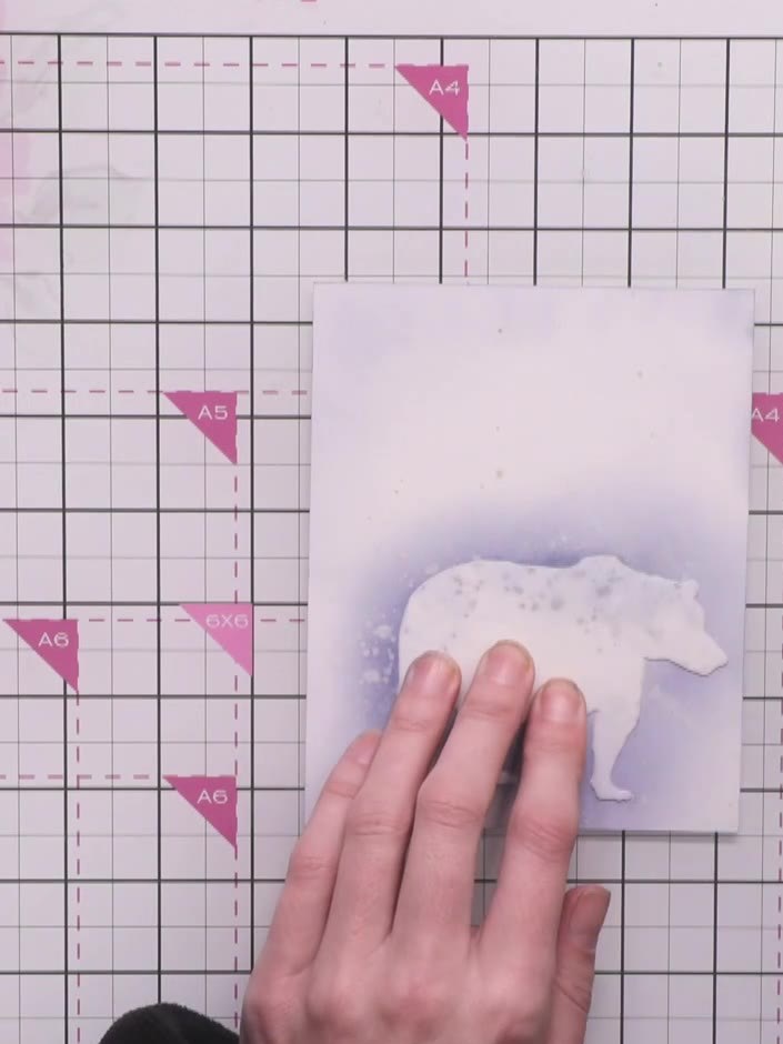Step 6: Using the Midnight ink pad, layer darker ink around the edges of the bear stencil to create depth. Work from d