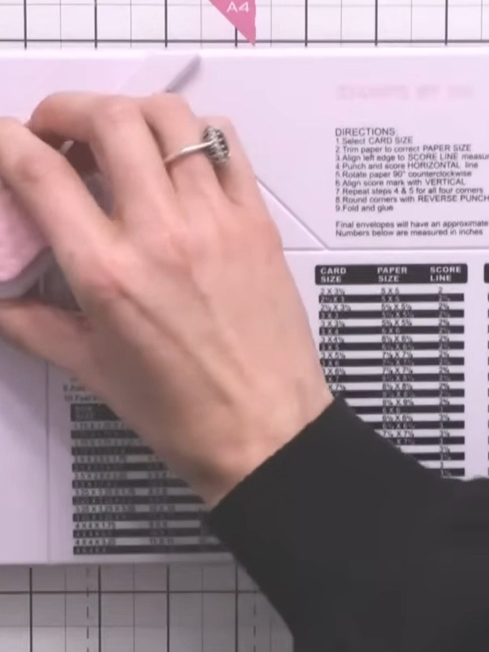 Step 7: Score all the internal lines on your envelope template. Nip the small corner flaps with scissors to help them 