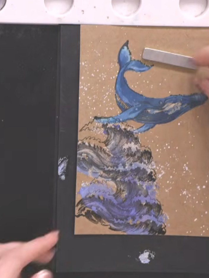 Step 12: Use a brush with white paint or white ink to add highlights to the wave heads and whale details. Blend the whi