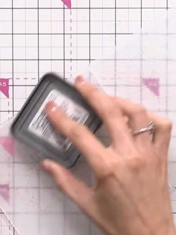 Step 3: Swipe the ink pad across both the inside and outside surfaces of your embossing folder to pick up all the fine