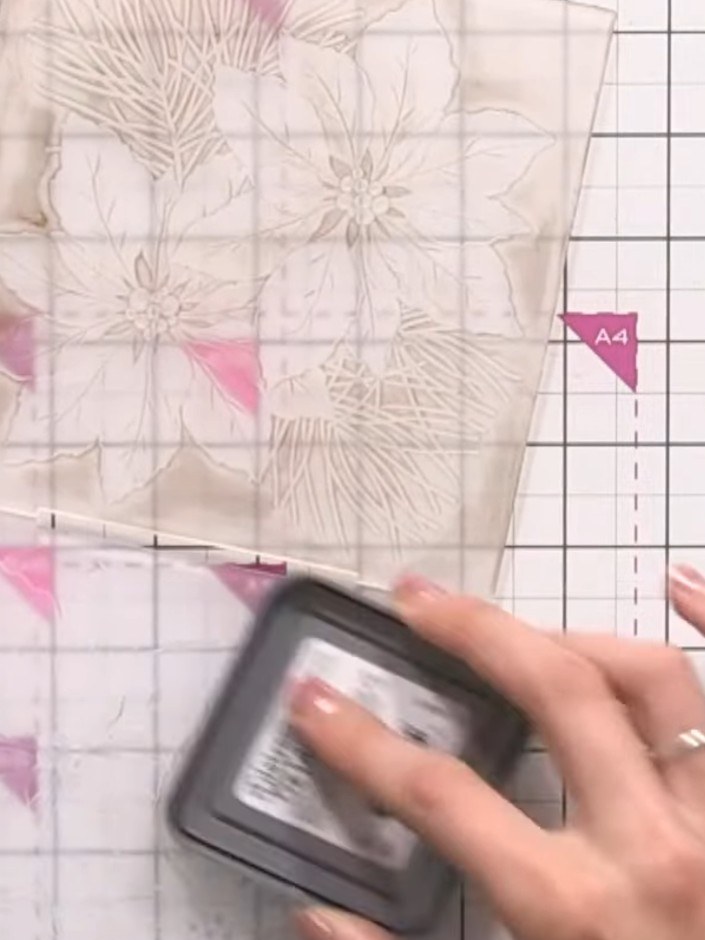 Step 4: Use the ink applicator to apply ink over the embossed design, working it into the raised areas. Don't worry ab