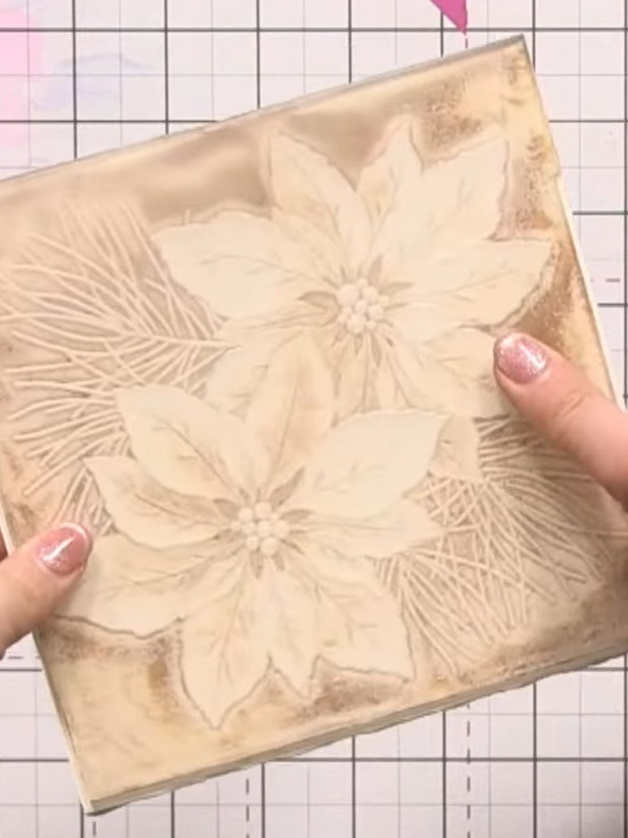 Step 7: Place your embossed cardstock into the embossing folder and run it through your die-cutting machine according 