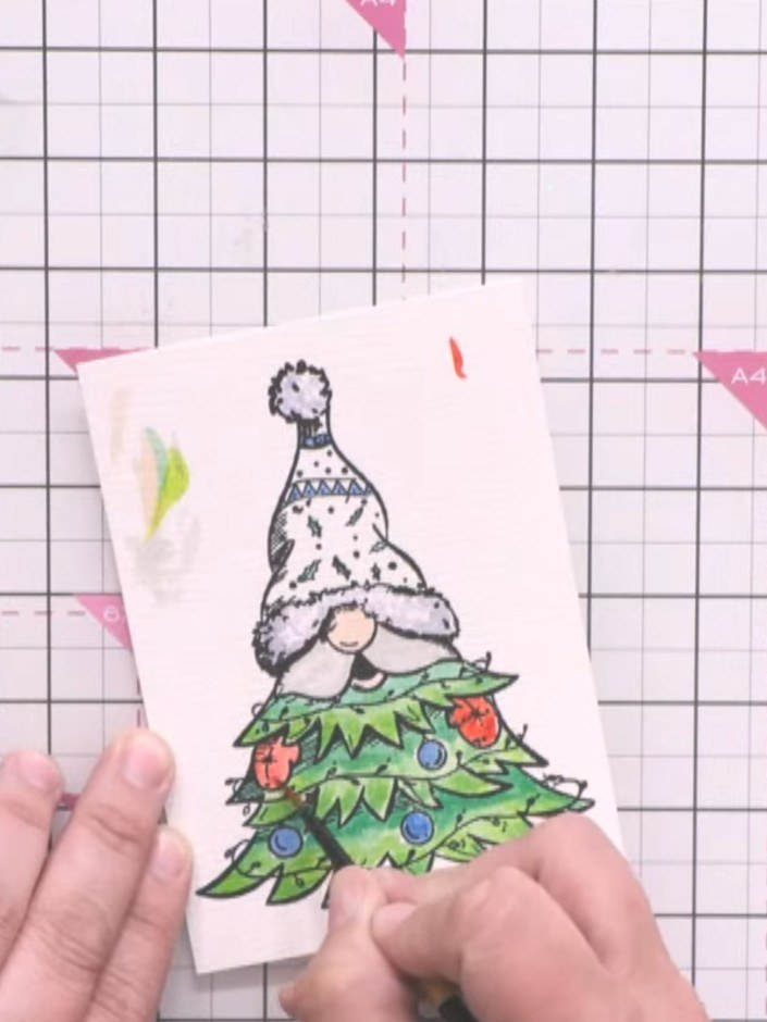 Step 6: Die-cut the gnome character from your coloured image using the coordinating die from the Gnome for the Holiday