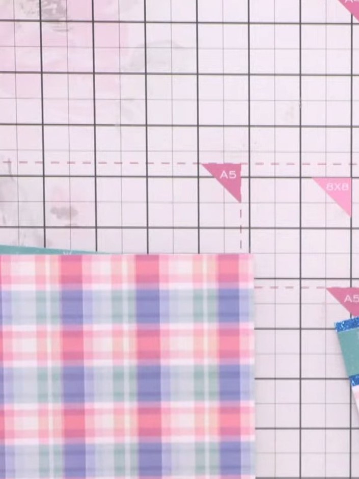 Step 6: Cut the patterned paper into strips using two contrasting designs - the pink and blue plaid pattern and the mi
