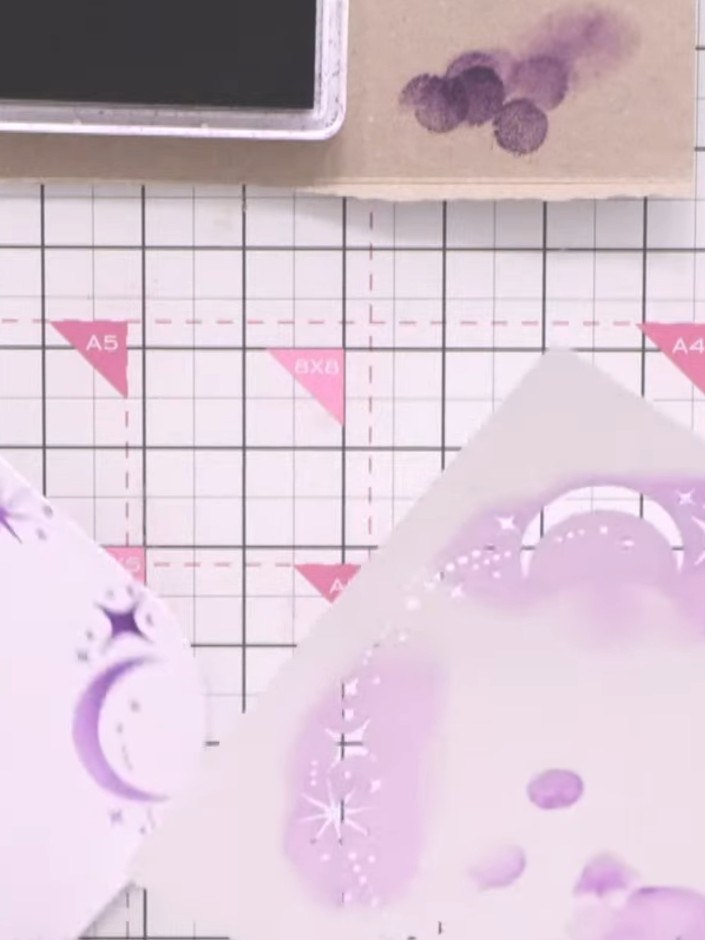 Step 6: Die-cut a smaller oval from the purple patterned paper using the next size down from the nesting die set. This