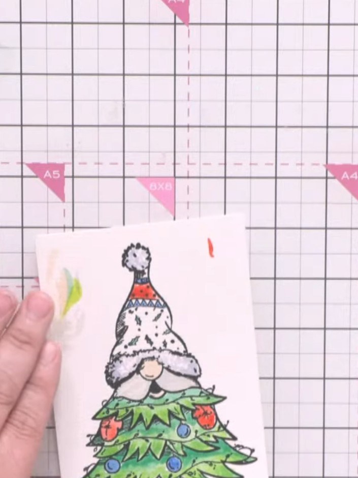 Step 6: Use the coordinating die to cut out the coloured gnome, removing the intricate details such as the hands and t