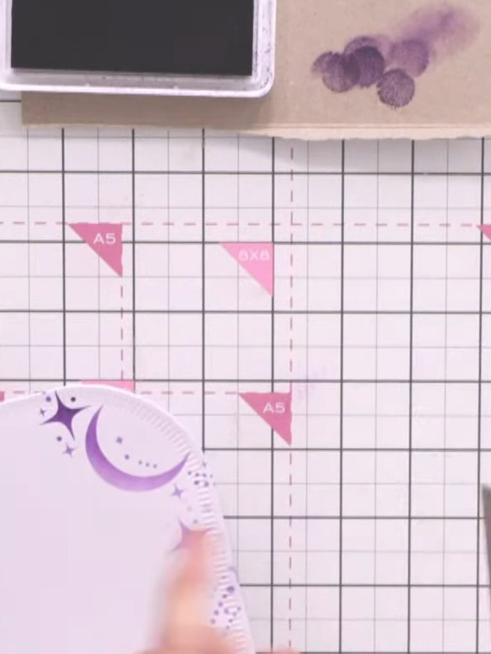 Step 7: Die-cut the coloured gnome character from the decorated cardstock. Mount the die-cut gnome onto the stencilled