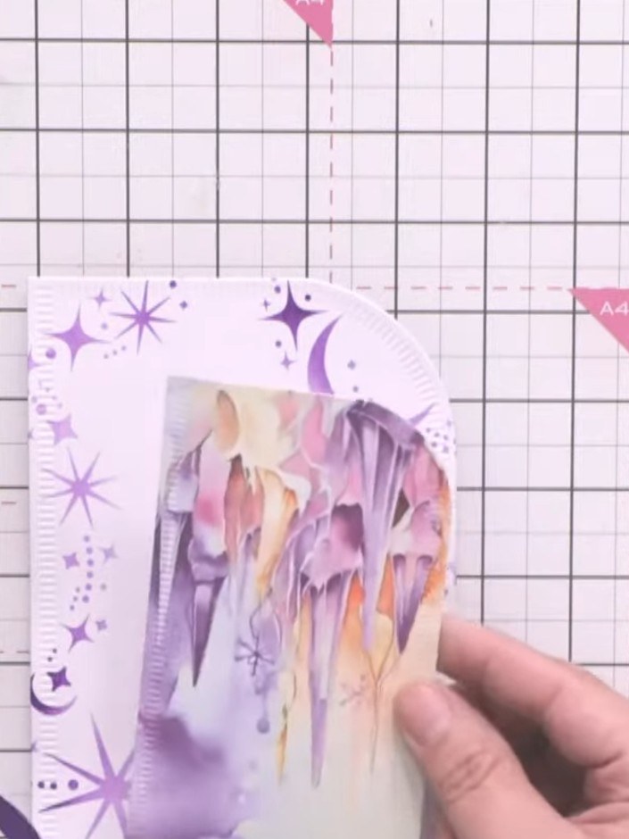 Step 8: Add a sentiment plaque or decorative element to complete your card. Position it centrally on the stencilled ba