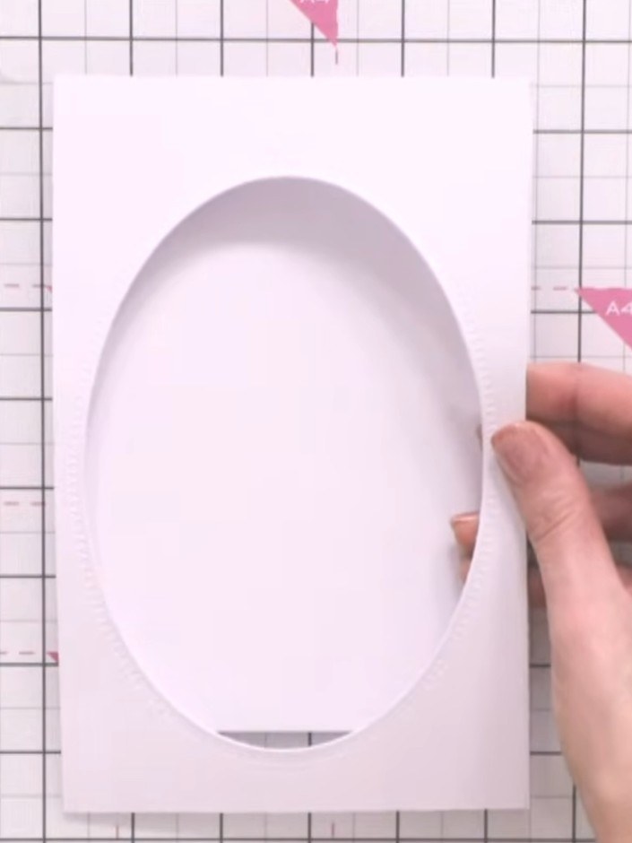 Step 2: Using the second-size oval die from the Classic Oval die set, cut an oval from white cardstock. This will be y