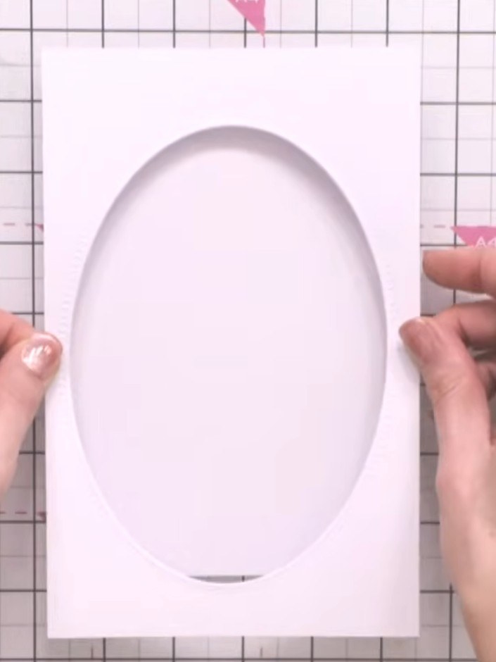 Step 5: Cut a smaller oval from your patterned paper using the oval die set. This will sit in the centre of your card 