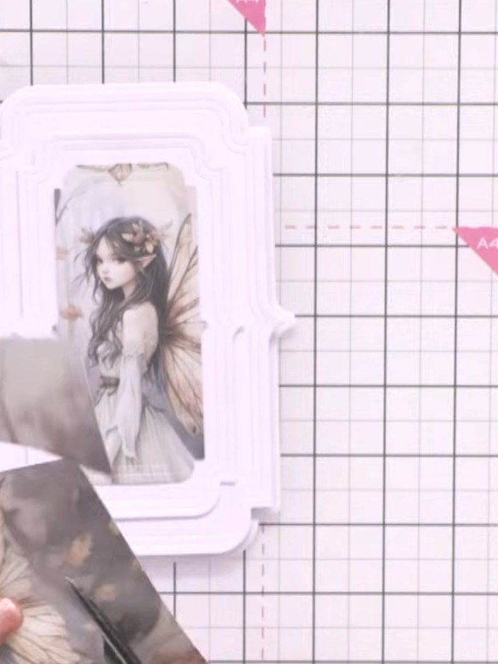 Step 10: Add optional embellishments from the paper pad, such as butterflies or preprinted words, to enhance your card 