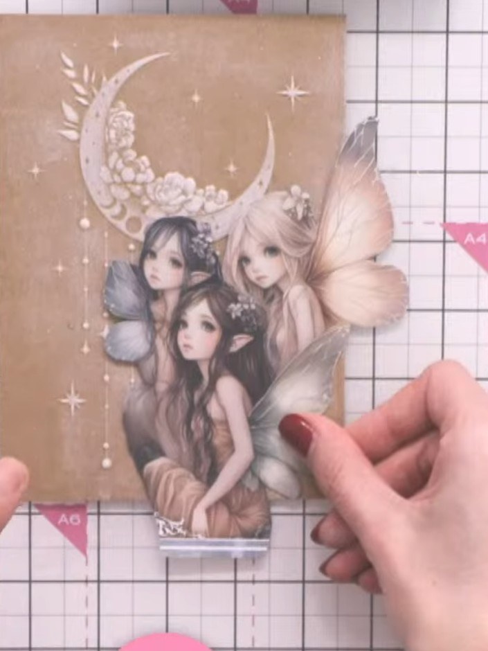 Step 4: Place the preprinted vellum featuring the three fairies from the Whispering Wings paper pack into the coordina