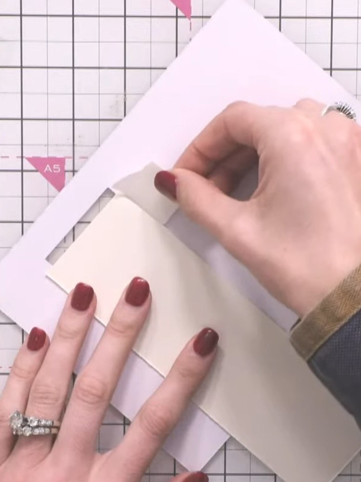 Step 5: Apply foam pads around the window aperture on your card base, leaving one edge open. This creates a raised cha