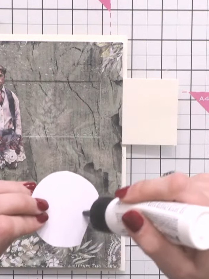 Step 9: Attach foam pads to the back of your main focal image (the character topper). Layer the foam pads to build up 