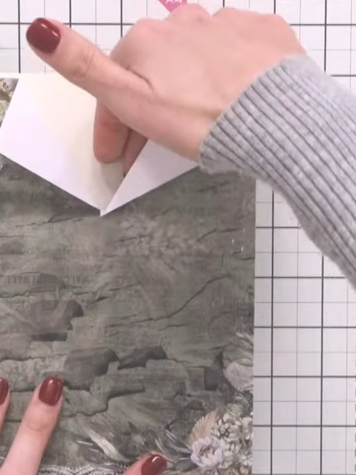 Step 7: Position the white insert piece at the top of the shirt front. Secure the shirt front to your card blank using
