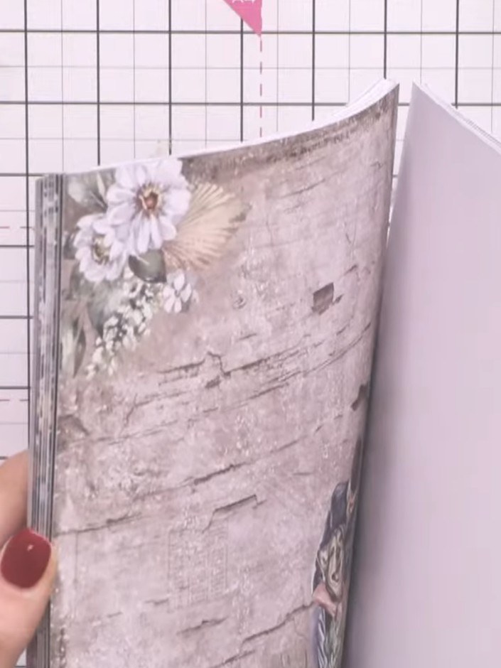 Step 1: Select a patterned or plain cardstock from the paper pad. Cut the exterior wallet piece using the die from the