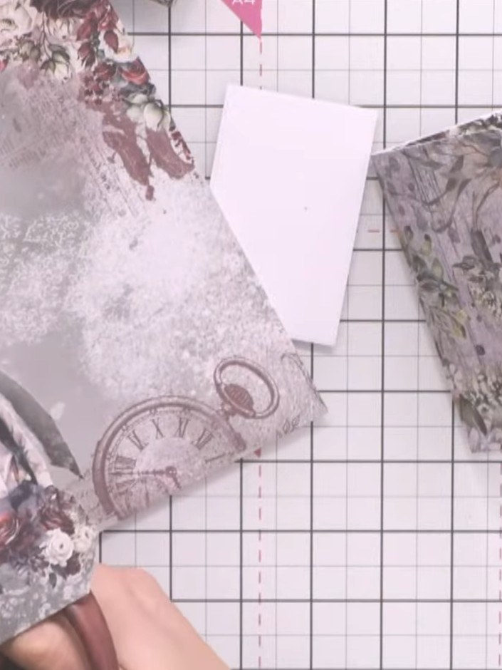 Step 12: Fussy cut a decorative element such as a figure or floral motif from the patterned paper. Layer it onto the fr