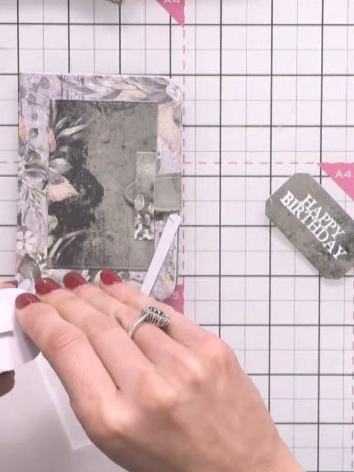 Step 14: Use a blending brush with coordinating ink to colour any white edges of the cardstock, hiding the white core.