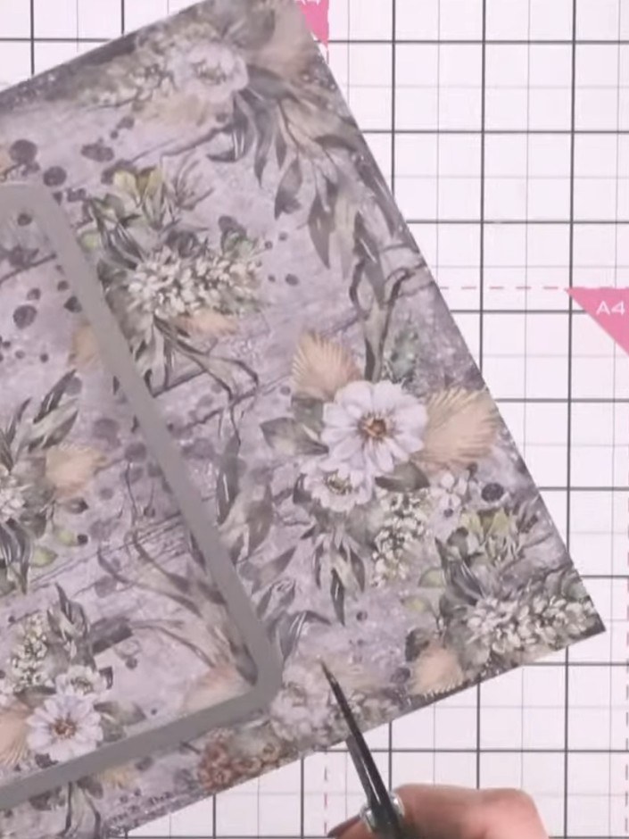 Step 2: Score the exterior piece firmly along the fold line using a scoring tool to create a crisp crease in the thick
