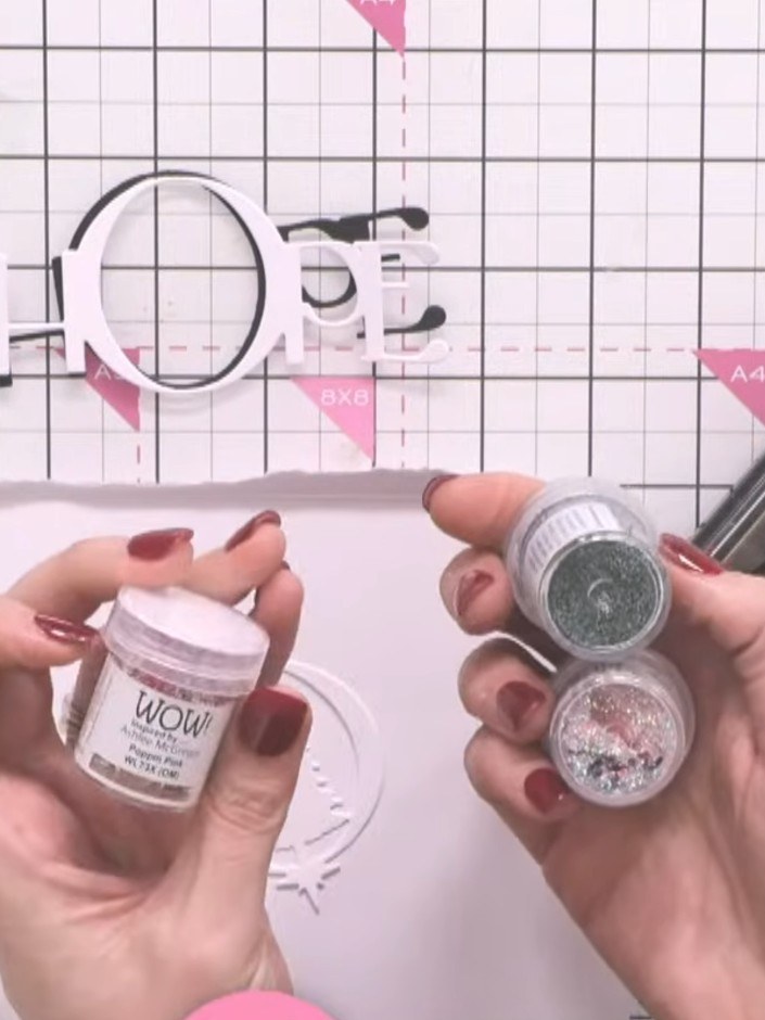 Step 2: Sprinkle embossing powder over the stamped brooch, ensuring it is completely covered. Tap off any excess powde