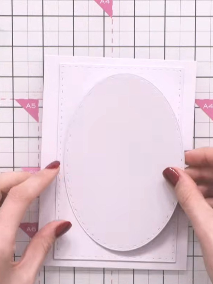 Step 3: Position the layered rectangle and oval pieces on your card base. Centre them or offset as desired to create y