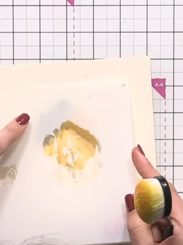 Step 10: Once all layers are complete, allow the ink to dry fully before removing the stencil from the card.